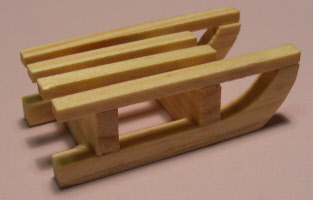 1 wooden toboggen