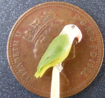 a dolls house miniature bird e