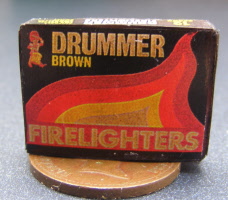 a dolls house miniature firelighter packet