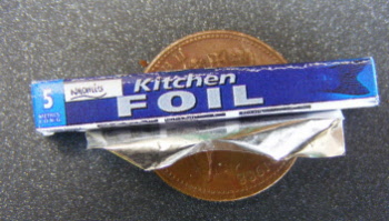 a dolls house miniature kithcen foil packet
