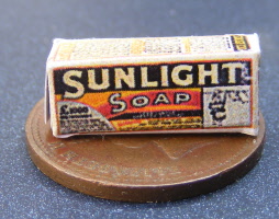 a dolls house miniature sunlight soap packet