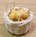 basket of yellow pomegrates