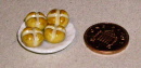 d18 hot cross buns on a plate