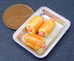 dolls house miniature sausage rolls small in s tray