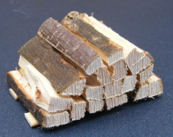 dolls-house-miniature a stack of logs