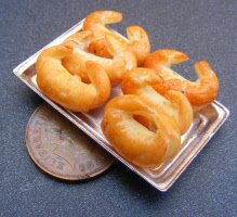 dolls-house-miniature croissants in a tray