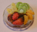 prepared fruit on a glass plate