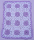 purple and white crochet cover