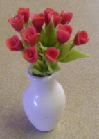 red tulips in a vase
