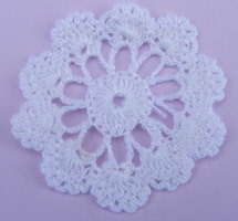 white crochet doilly