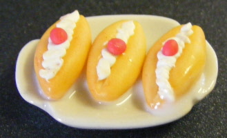 y new cream cakes on a plate